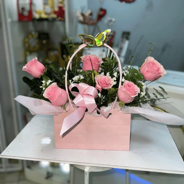 Cartera de rosas rosadas
