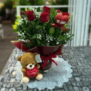 Rosas en pecera de vidrio más peluche a elección
