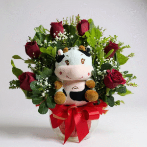 Pecera con 6 rosas rojas + peluche de vaca