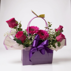 Cartera fucsia de rosas y gerberas
